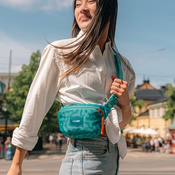 Biodrówka nerka antykradzieżowa Pacsafe Go - turkusowa